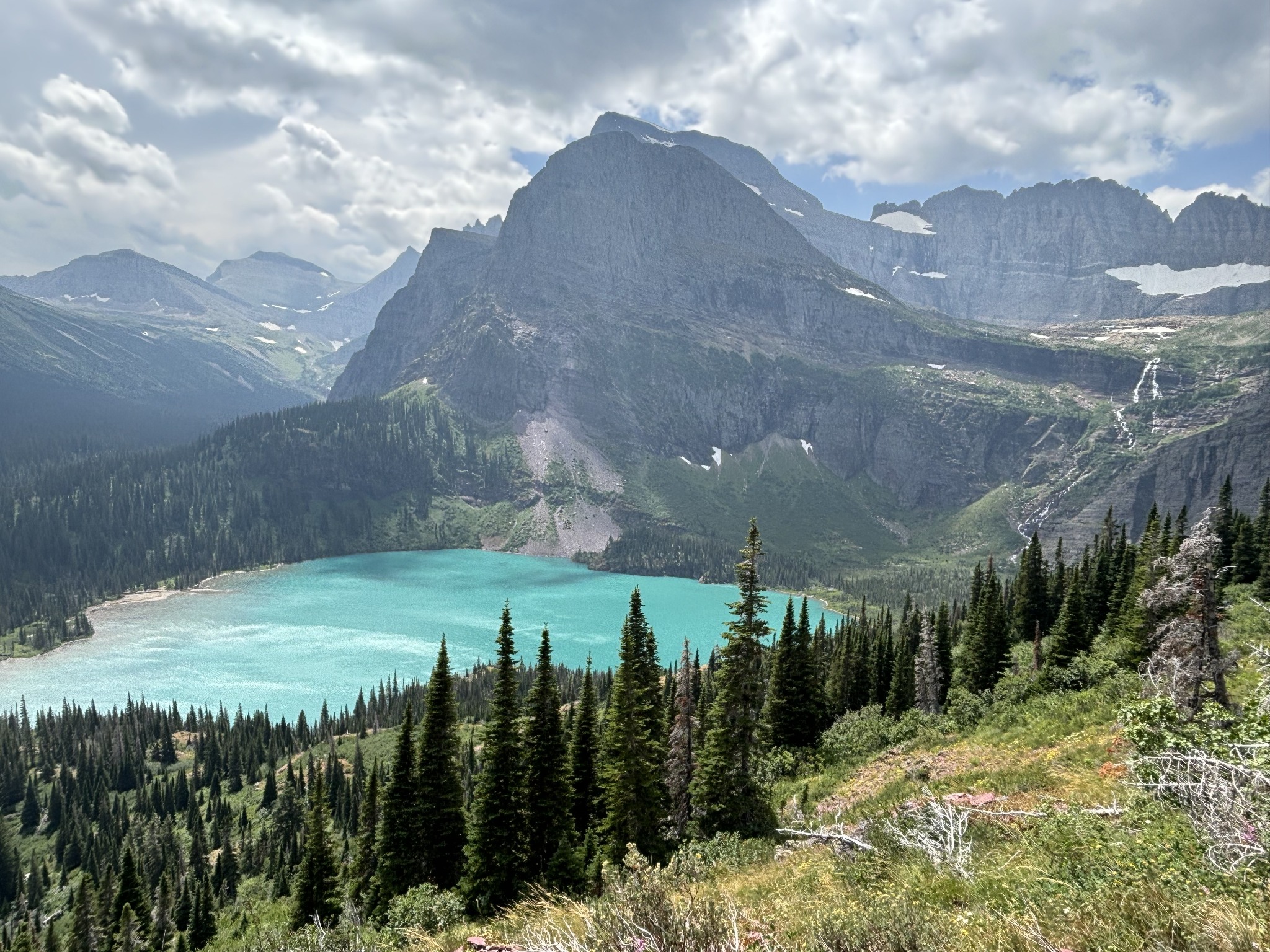Turquoise lake surrounded by mountains